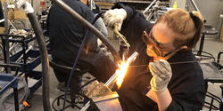 Grad student Rebecca Erde MID 19 masters the ancient art of brazing at the Tokyo College of Cycle Design