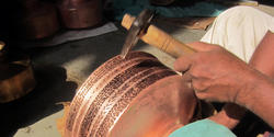 Joshua Enck MFA 03 FD working with copper in India as a Fulbright-Nehru fellow