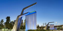 A stormwater filtration system integrates with "light shower" sculptures at Sherbourne Common park in Toronto