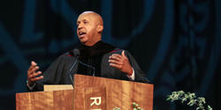 RISD commencement keynote speaker Bryan Stevenson at podium