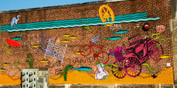 Keri King 05 IL created this mural—called What's in the River?—in the Olneyville section of Providence