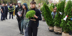 RISD community members in a plant parade to express alarm about global warming