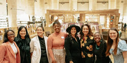 presenters and honorees gather at the Fleet Library for a group shot