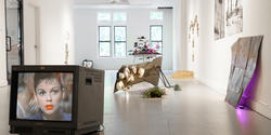 Sculptures on view in a white-walled gallery