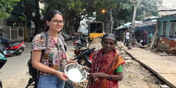RISD student Upasana Pandey standing with a Bengaluru resident