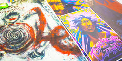 a colorful stack of music-inspired posters by RISD students