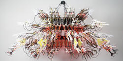 wild-looking lamp created with circuit boards and other electronic parts
