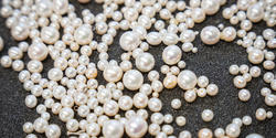 a plethora of pearls in varying sizes and tones