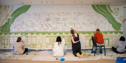 Students work on a mural