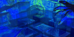 moody blue image of a hand manipulating building models