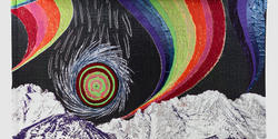 colorful textile piece featuring mountains and a rainbow