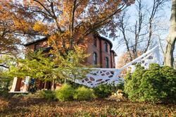Woods Gerry Admissions Office Building with cloth installation outside