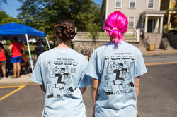 Move in day student helpers in uniform t-shirts