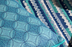 Textiles created by individuals on Weft, a site that allows anyone to create their own woven textiles