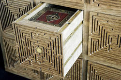 A secret drawer in The Daedalus Cabinet, by Justin Seow 18 FD, reveals another puzzle object