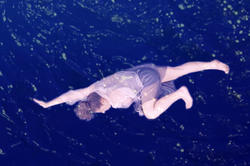 Still of a person laying on water from Change the way you look at things; things you look at change