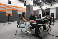 Ji Hoo Kim MFA 20 DM and EFS Programs Head Shawn Greenlee 96 PR working in the new studio