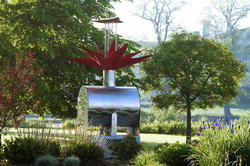 Whorl, by Allison Newsome MFA 83 CR, uses upper and lower canopies to capture precious rainwater