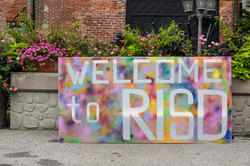 Large, colorful Welcome to RISD sign