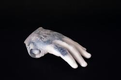 A sculpture of a hand by Brown RISD Dual Degree alum Yidan Zeng