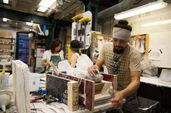 an Industrial Design student building work inside the ID shop