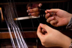 Closeup of a threading loom.