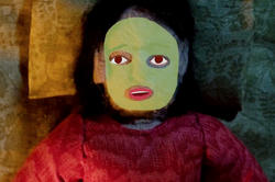 animated character wearing green cosmetic face mask