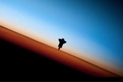 the space shuttle against a beautiful sky