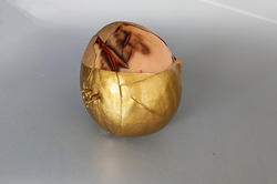 avocado pit dipped in gold paint