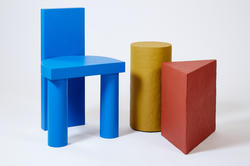 basic wooden furniture pieces in primary colors