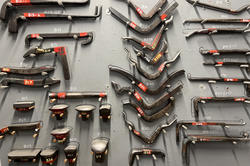 A wall of metalsmithing tools in the J+M studio
