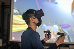 Student in VR headset.