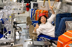 Claire Kim explores a copy of the Orion capsule used by NASA to train astronauts