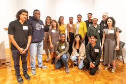 a new cohort of graduate-level Presidential Fellows poses for a photo with Crystal Williams