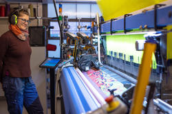 Textiles tech Holly Spenner watches the speedy new Jacquard loom at work