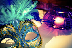 image of two colorful carnival masks
