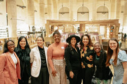 presenters and honorees gather at the Fleet Library for a group shot