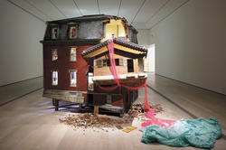 image of a Suh installation called Fallen Star that resembles a crumbling New England house