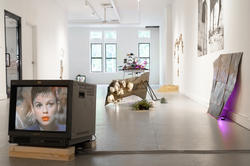 Sculptures on view in a white-walled gallery
