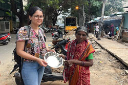 RISD student Upasana Pandey standing with a Bengaluru resident