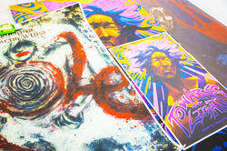 a colorful stack of music-inspired posters by RISD students