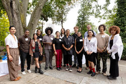 Presidential Fellows pose in front of Woods-Gerry House for a group photo