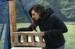 the artist working outdoors