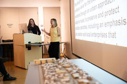 Two student give a presentation