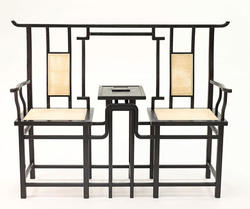 Two connected chairs made collaboratively by Furniture Design alums Ruobing Chen and Jiayin Feng