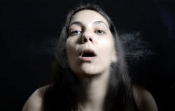 Student work by Alex Gencarelli MFA 2017. Closeup photograph of a woman behind a foggy window.
