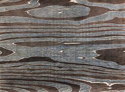 Closeup of black and blue dyed wood grain 