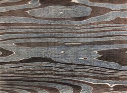 Closeup of black and blue dyed wood grain