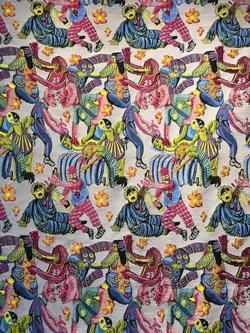Student work by Sandra Lopez-Naz BFA 2017. An embroidered cloth showing a colorful display of several odd characters.