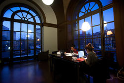 students working at a table in 15 West